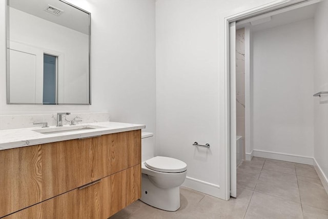 full bathroom with visible vents, toilet, vanity, tile patterned flooring, and baseboards