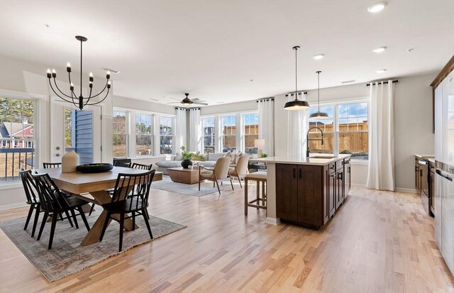 2 Codman Way Unit 301, Westborough, MA 01581 - dining space featuring light wood-style flooring, healthy amount of natural light, recessed lighting, and a chandelier