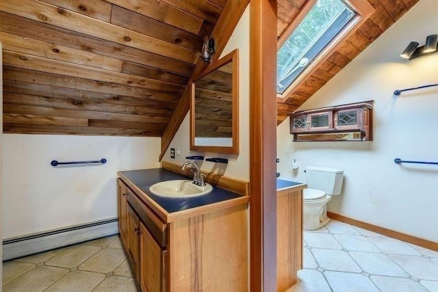 20 Lawton Rd, Leverett, MA 01054 - half bathroom with a baseboard heating unit, a skylight, lofted ceiling, wood ceiling, and toilet