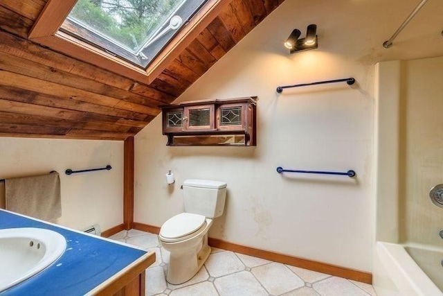 20 Lawton Rd, Leverett, MA 01054 - full bathroom with vaulted ceiling, a skylight, wooden ceiling, toilet, and baseboards