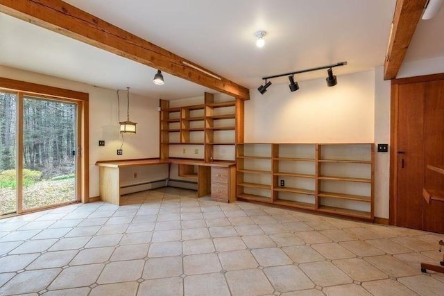 20 Lawton Rd, Leverett, MA 01054 - basement featuring rail lighting and a baseboard radiator