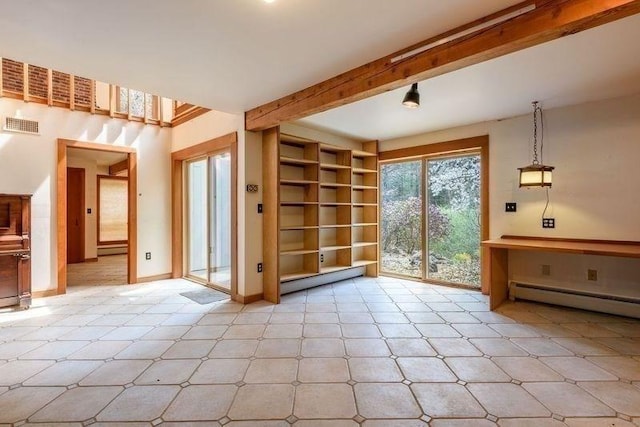 20 Lawton Rd, Leverett, MA 01054 - entryway featuring a baseboard radiator, beam ceiling, built in features, and baseboards
