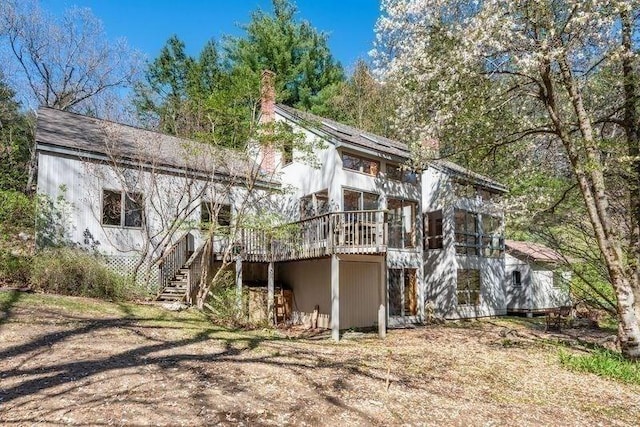 20 Lawton Rd, Leverett, MA 01054 - back of house with stairs, a wooden deck, and a chimney