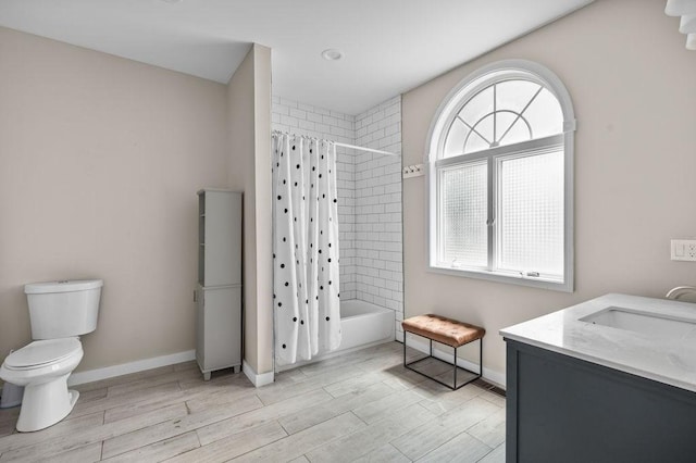 4002 Church St, Palmer, MA 01069 - full bathroom with wood finished floors, shower / bath combo, and vanity