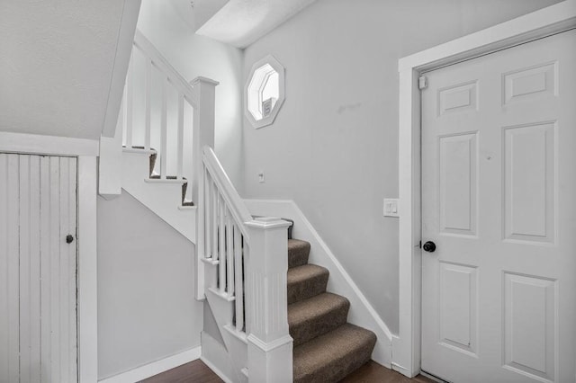 4002 Church St, Palmer, MA 01069 - staircase featuring baseboards and wood finished floors