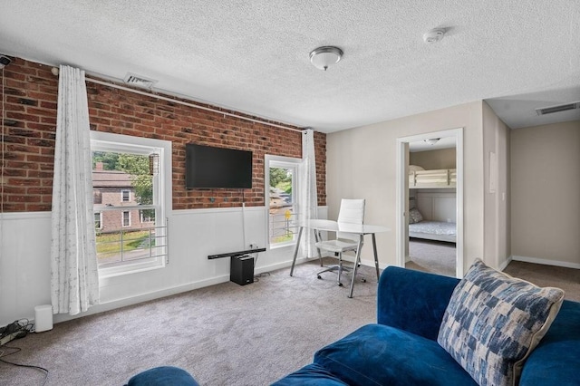 4002 Church St, Palmer, MA 01069 - office space with carpet, wainscoting, brick wall, and a textured ceiling