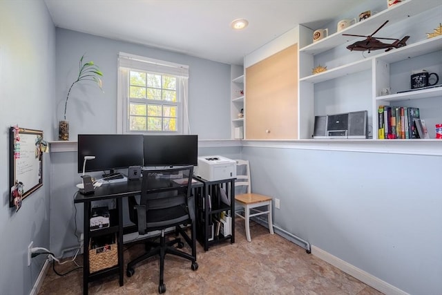 office space featuring baseboards