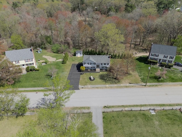 aerial view featuring a view of trees