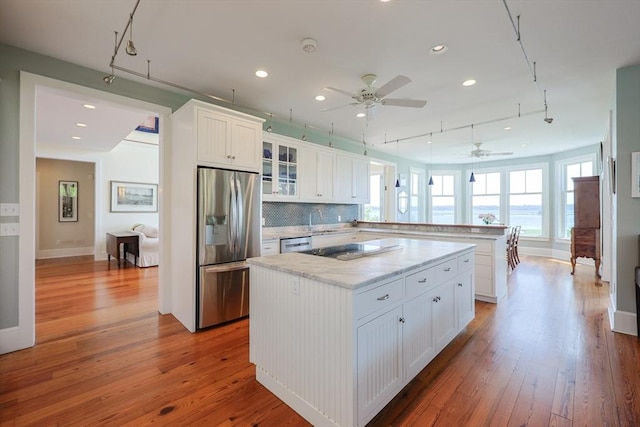 1794 Drift Unit E, Westport, MA 02790 - kitchen featuring stainless steel appliances, a peninsula, ceiling fan, hardwood / wood-style floors, and recessed lighting