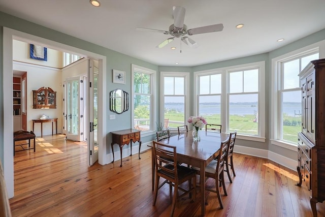 1794 Drift Unit E, Westport, MA 02790 - dining room with healthy amount of natural light, wood-type flooring, a ceiling fan, recessed lighting, and a water view