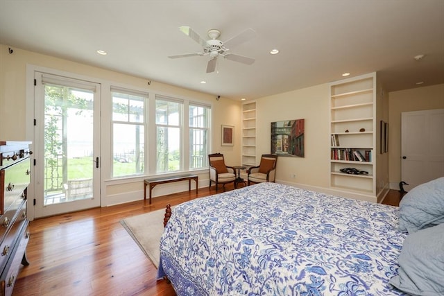 1794 Drift Unit E, Westport, MA 02790 - bedroom with access to exterior, multiple windows, wood finished floors, and recessed lighting