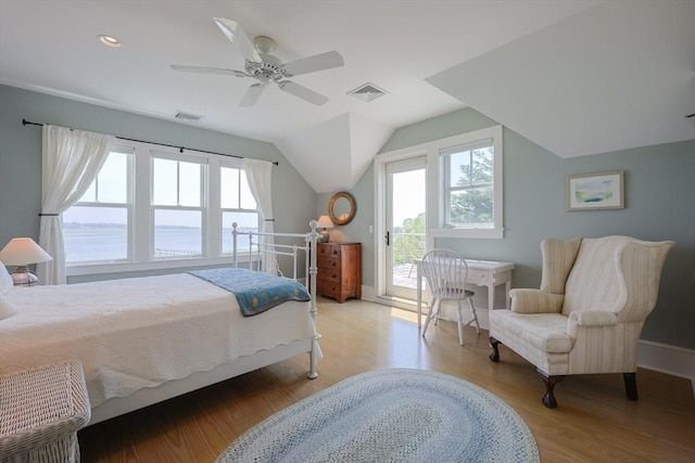 1794 Drift Unit E, Westport, MA 02790 - bedroom featuring access to outside, multiple windows, lofted ceiling, light wood finished floors, and ceiling fan
