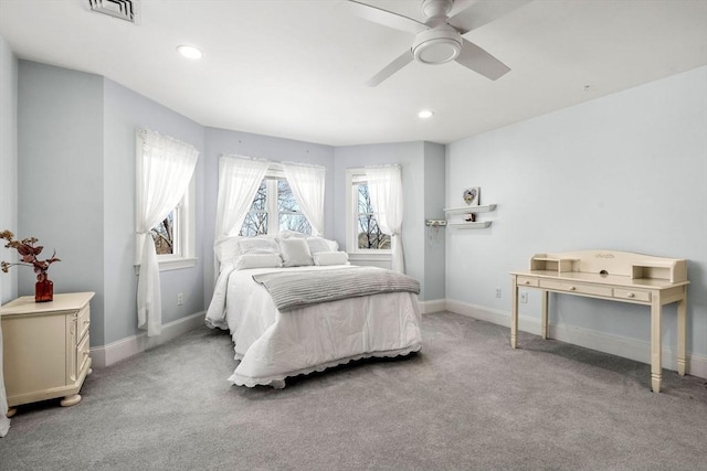bedroom with recessed lighting, baseboards, and light colored carpet