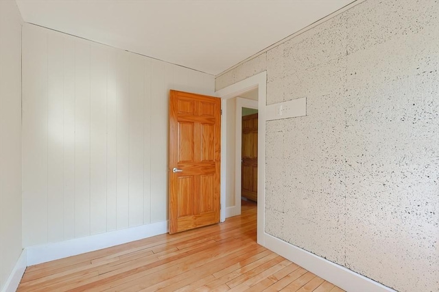empty room with light wood-style flooring