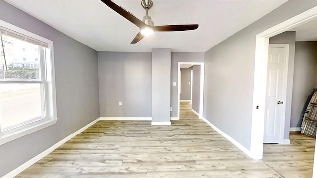 55 Mendon St, Worcester, MA 01604 - unfurnished room with a ceiling fan, plenty of natural light, light wood-style floors, and baseboards
