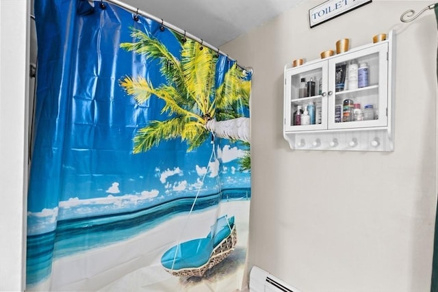 bathroom featuring curtained shower