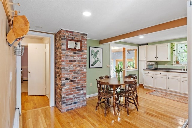 7 Squannacook Ter, Townsend, MA 01469 - dining area featuring light wood finished floors, ornamental molding, baseboards, and recessed lighting