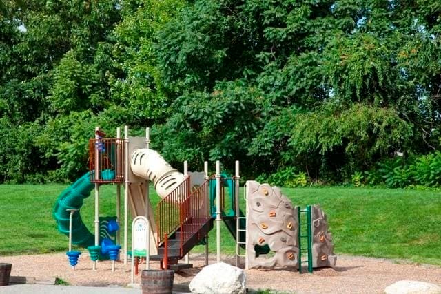 view of playground with a yard