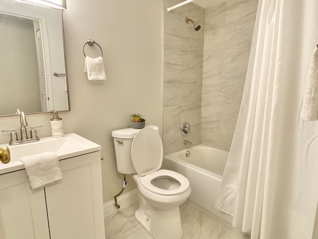 full bathroom featuring shower / bath combo, vanity, and toilet