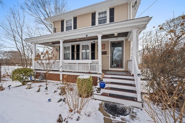 view of front of home featuring covered porch