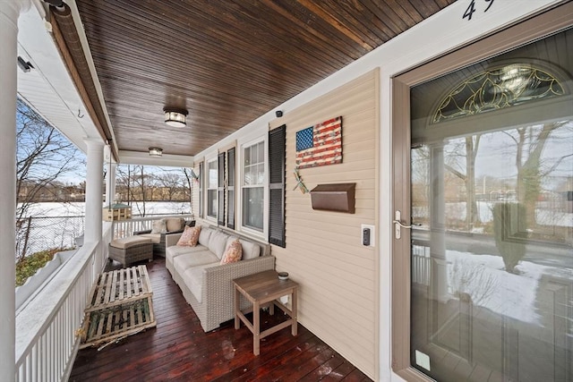 sunroom with wooden ceiling