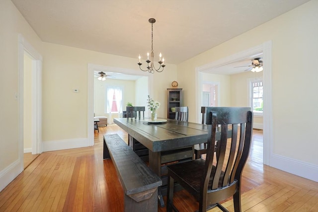 6 Minerva St, Swampscott, MA 01907 - dining area with baseboards, healthy amount of natural light, and light wood-type flooring