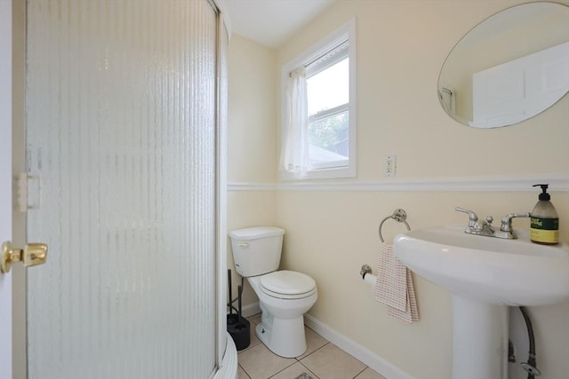 6 Minerva St, Swampscott, MA 01907 - full bath with a stall shower, tile patterned floors, toilet, baseboards, and a sink