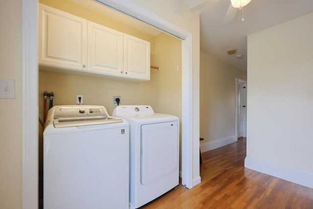 6 Minerva St, Swampscott, MA 01907 - washroom featuring cabinet space, independent washer and dryer, light wood-style floors, baseboards, and a ceiling fan