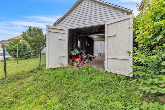 view of outdoor structure with a yard