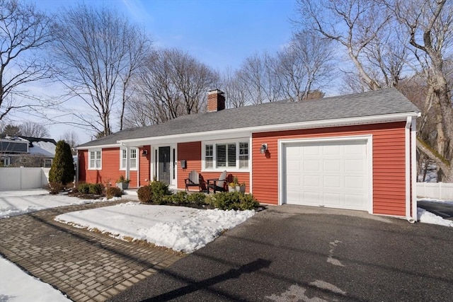 ranch-style home with a garage