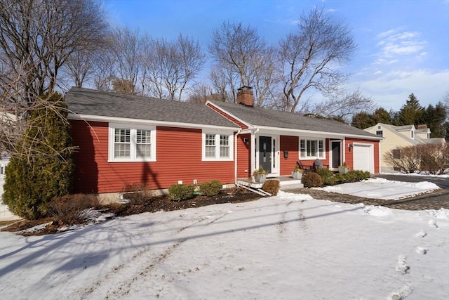 single story home with a garage