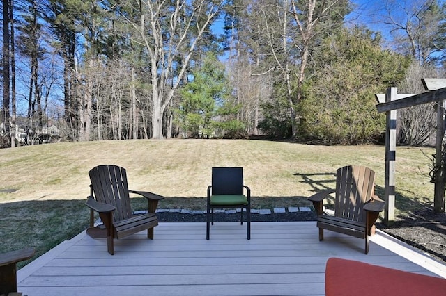 wooden terrace with a yard