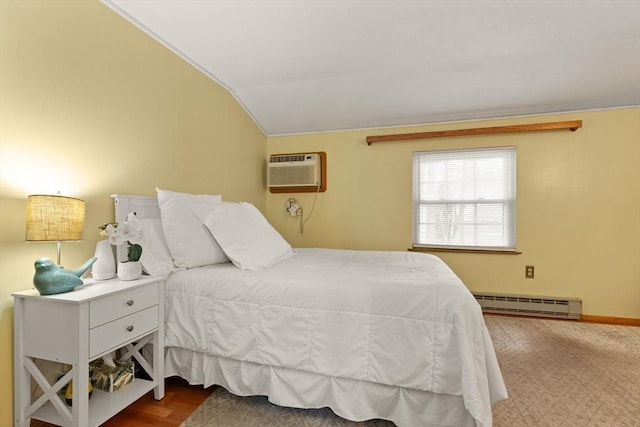 bedroom with a baseboard radiator, vaulted ceiling, and a wall mounted AC