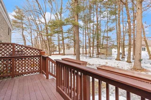 view of snow covered deck