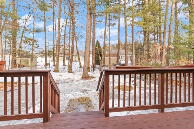 view of snow covered deck