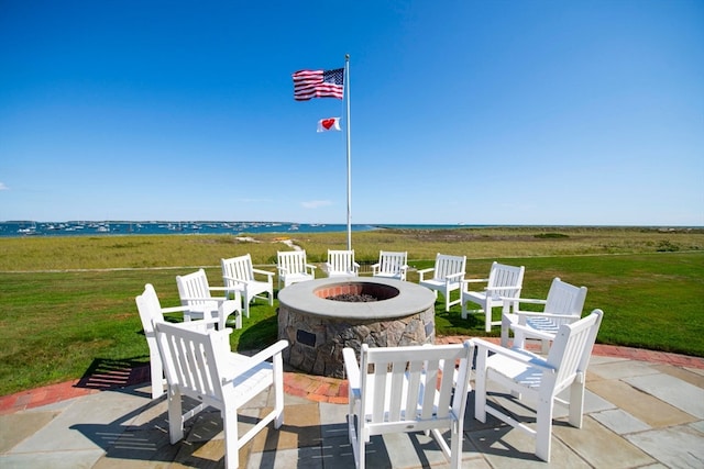 view of patio featuring an outdoor fire pit