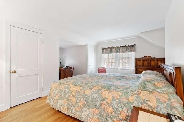 bedroom with light wood-style floors