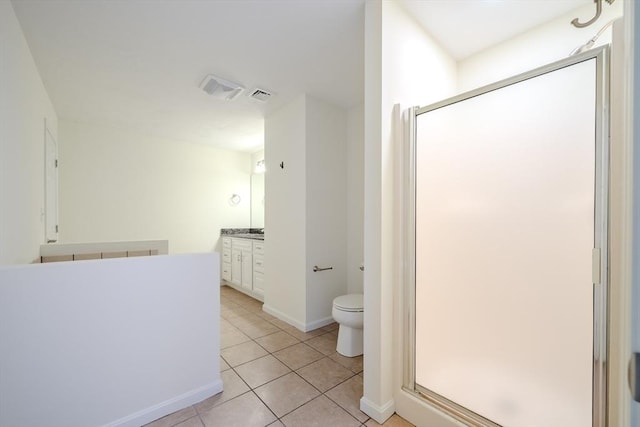 full bath with a stall shower, toilet, visible vents, tile patterned floors, and vanity