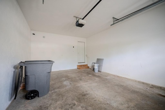 garage featuring a garage door opener