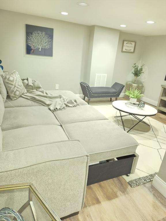 2 Neponset Pl, Canton, MA 02021 - living area featuring wood finished floors, recessed lighting, and baseboards