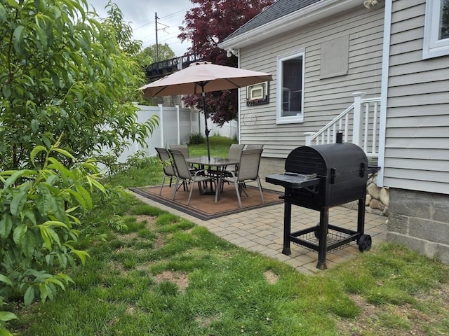 2 Neponset Pl, Canton, MA 02021 - view of patio featuring a grill and outdoor dining area