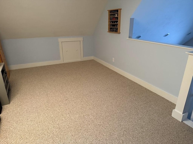 16 White Pine Knl Unit 199, Westford, MA 01886 - additional living space with carpet flooring, lofted ceiling, and baseboards