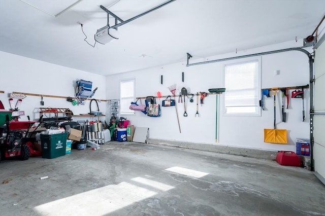 garage featuring a garage door opener