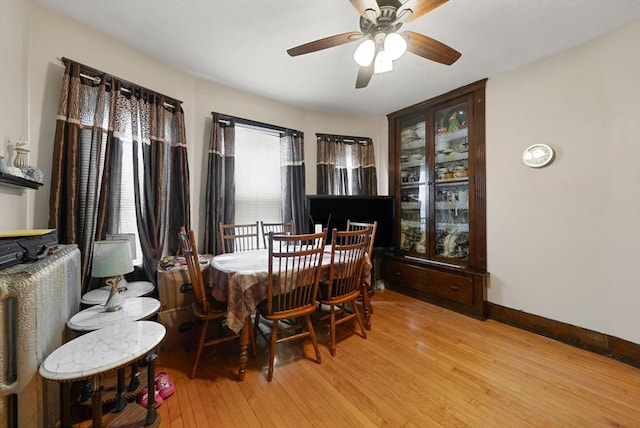 562 Broadway, Everett, MA 02149 - dining space with light wood-type flooring and a ceiling fan