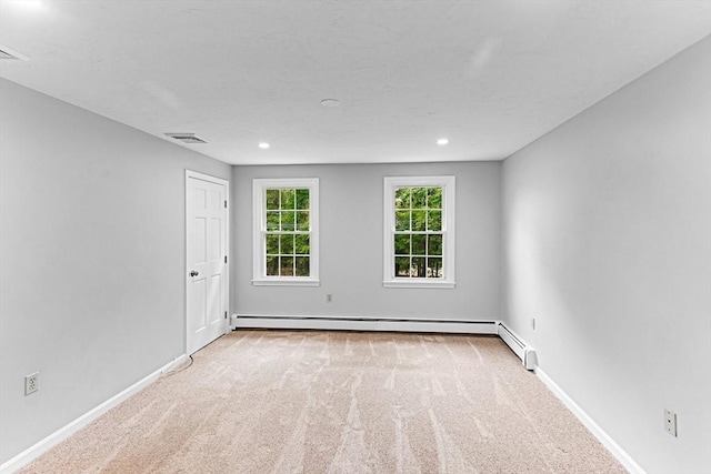 300 Maple St, Franklin, MA 02038 - carpeted empty room with baseboards, recessed lighting, and a baseboard heating unit