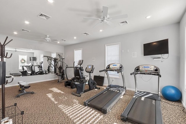 workout area featuring ceiling fan