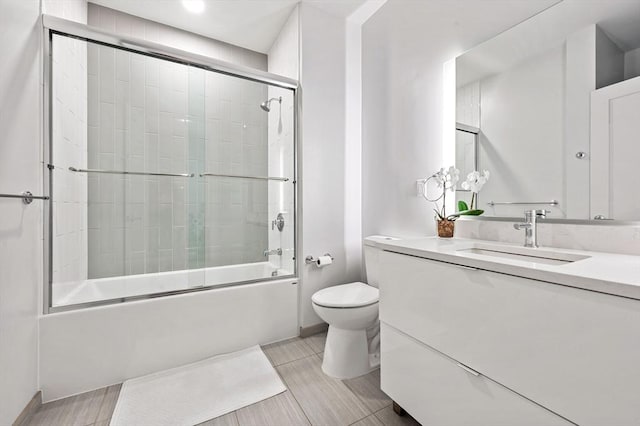 7 Lisbon St Unit 201, Boston, MA 02128 - full bathroom featuring vanity and combined bath / shower with glass door