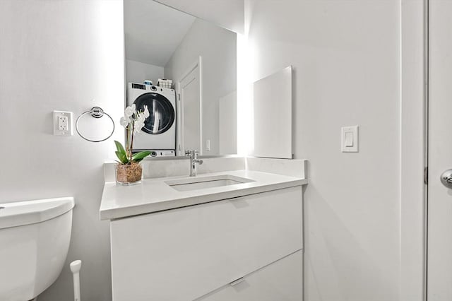 7 Lisbon St Unit 201, Boston, MA 02128 - bathroom with stacked washer / drying machine and vanity
