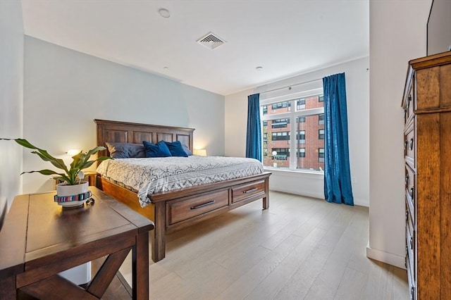 7 Lisbon St Unit 201, Boston, MA 02128 - bedroom featuring light wood-style flooring and baseboards