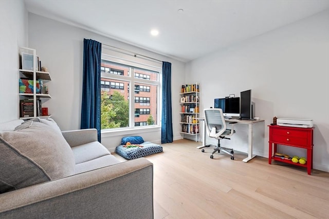 7 Lisbon St Unit 201, Boston, MA 02128 - home office featuring wood finished floors and recessed lighting